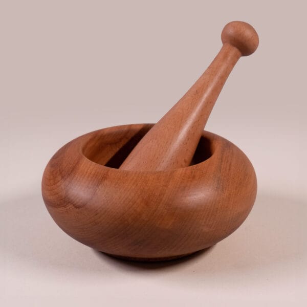 Wooden pestle - woodin water