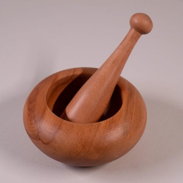 Wooden pestle - woodin water