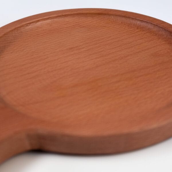 Handcrafted rolana wooden platter made from natural wood, featuring a smooth finish and unique grain patterns for elegant dining and serving